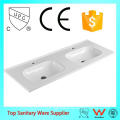 foshan cheap commercial mounting above cabinet bathroom basin